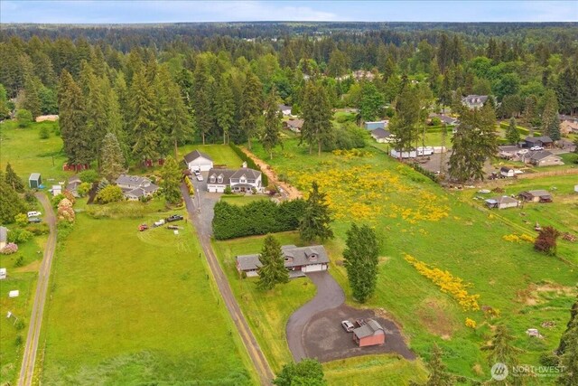 12125 E Woodland Ave, Puyallup, WA 98373 - drone / aerial view of a heavily wooded area