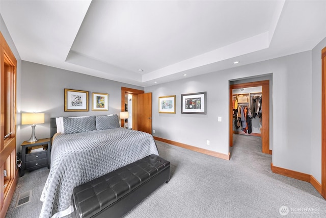 891 E Lake Samish Dr, Bellingham, WA 98229 - carpeted bedroom featuring baseboards, a tray ceiling, a spacious closet, recessed lighting, and a closet