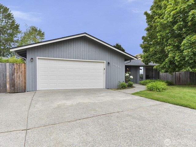 25705 117th Pl SE, Kent, WA 98030 - view of front of home with concrete driveway and an attached garage