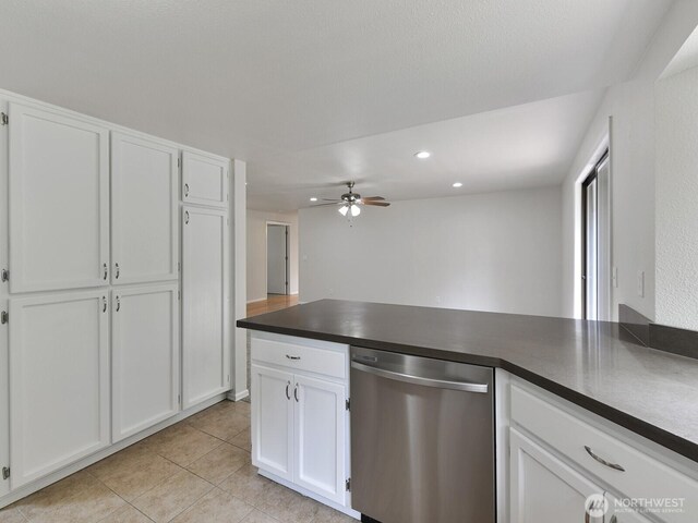 25705 117th Pl SE, Kent, WA 98030 - kitchen with dishwasher, dark countertops, light tile patterned floors, white cabinetry, and a ceiling fan