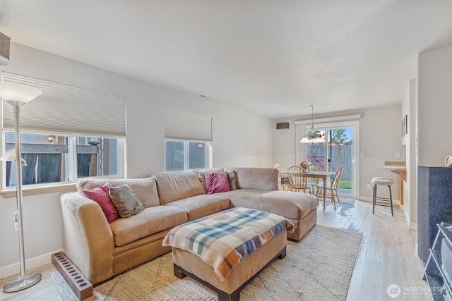 125 99th Street Ct E, Tacoma, WA 98445 - living area featuring light wood-style floors and baseboards