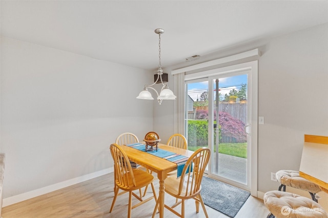 125 99th Street Ct E, Tacoma, WA 98445 - dining space featuring light wood-style floors and baseboards