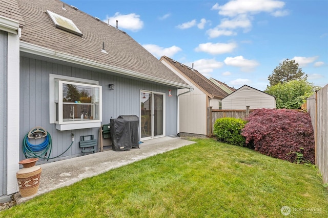 125 99th Street Ct E, Tacoma, WA 98445 - rear view of property with roof with shingles and a patio