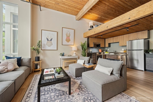 1812 19th Ave Unit 205, Seattle, WA 98122 - living area featuring wooden ceiling with exposed beams and wood finished floors