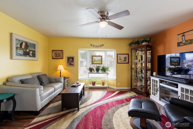 367 Colorado St, Longview, WA 98632 - living room featuring wood finished floors, ceiling fan, and baseboards