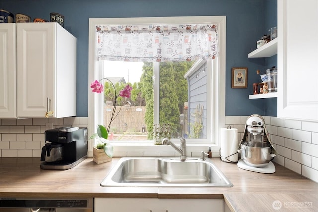 367 Colorado St, Longview, WA 98632 - kitchen featuring a sink, light countertops, white cabinets, and tasteful backsplash