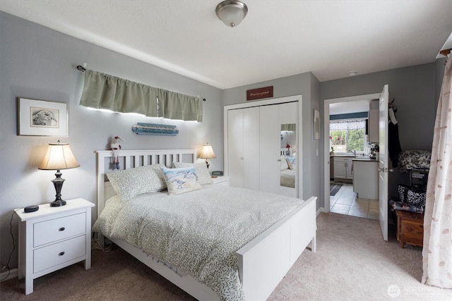 367 Colorado St, Longview, WA 98632 - bedroom featuring light colored carpet, a closet, and a sink