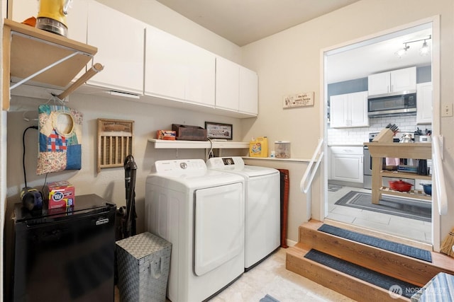 367 Colorado St, Longview, WA 98632 - laundry area with washing machine and dryer and cabinet space