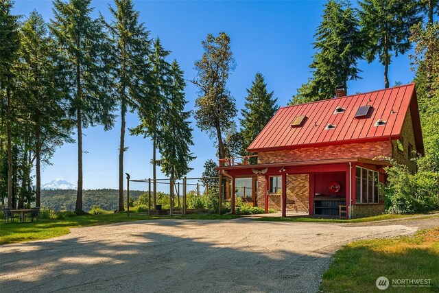 12010 SW Wesleyan Way Unit 1, Vashon, WA 98070 - view of community featuring a mountain view