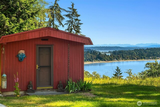12010 SW Wesleyan Way Unit 1, Vashon, WA 98070 - view of shed featuring a water and mountain view