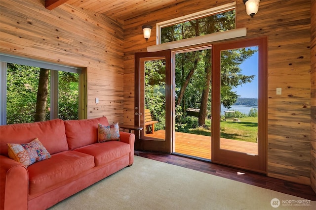 12010 SW Wesleyan Way Unit 1, Vashon, WA 98070 - entryway featuring a water view, wooden walls, wood finished floors, and wooden ceiling