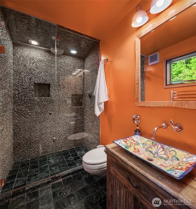 12010 SW Wesleyan Way Unit 1, Vashon, WA 98070 - full bath featuring a stall shower, toilet, and vanity