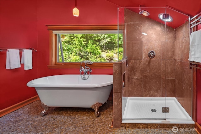 12010 SW Wesleyan Way Unit 1, Vashon, WA 98070 - full bathroom featuring a freestanding tub, a shower stall, and baseboards