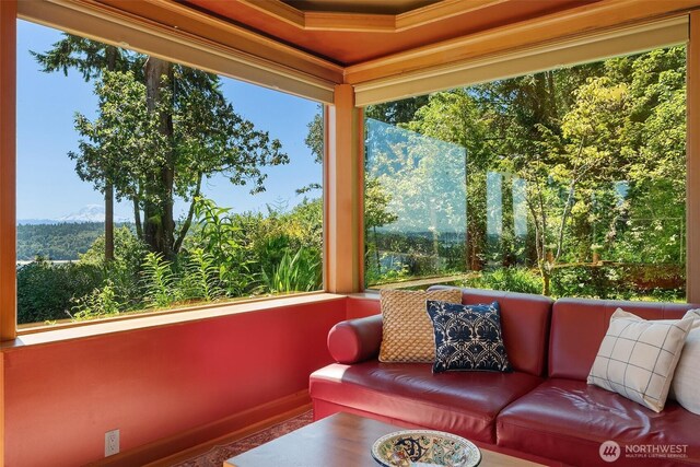 12010 SW Wesleyan Way Unit 1, Vashon, WA 98070 - sunroom / solarium with ornamental molding, baseboards, and a mountain view