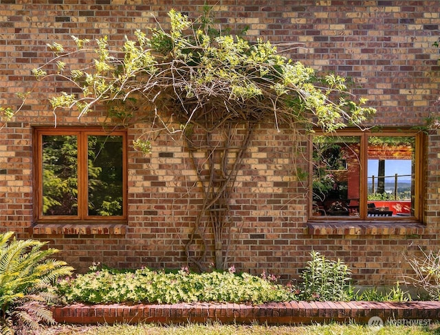 12010 SW Wesleyan Way Unit 1, Vashon, WA 98070 - view of home's exterior featuring brick siding