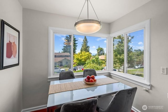 6050 36th Ave SW, Seattle, WA 98126 - dining room featuring baseboards