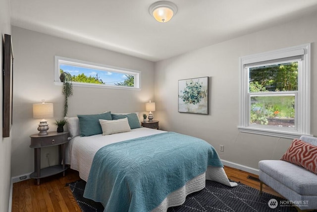6050 36th Ave SW, Seattle, WA 98126 - bedroom featuring wood finished floors and baseboards