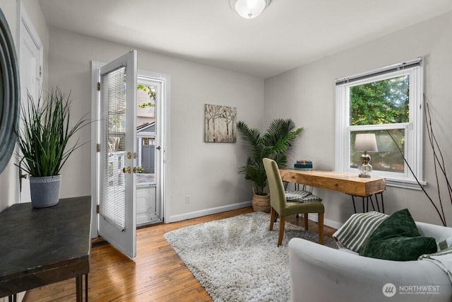 6050 36th Ave SW, Seattle, WA 98126 - office area featuring wood finished floors and baseboards