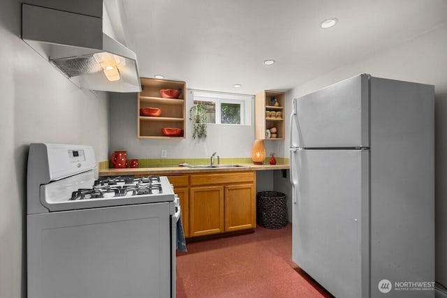 6050 36th Ave SW, Seattle, WA 98126 - kitchen with white appliances, a sink, open shelves, wall chimney exhaust hood, and light countertops