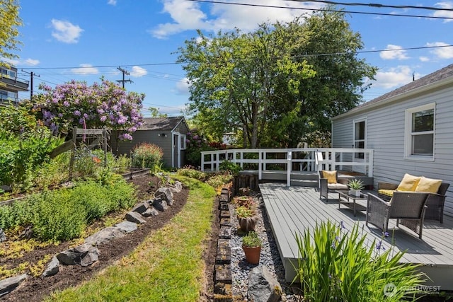 6050 36th Ave SW, Seattle, WA 98126 - view of yard featuring a wooden deck and outdoor lounge area