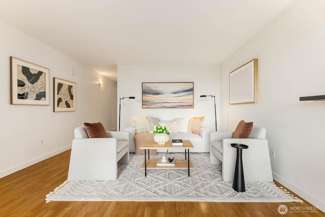 11515 Greenwood Ave N Unit C, Seattle, WA 98133 - living room featuring wood finished floors and baseboards
