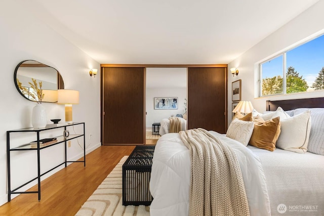 11515 Greenwood Ave N Unit C, Seattle, WA 98133 - bedroom with wood finished floors and baseboards