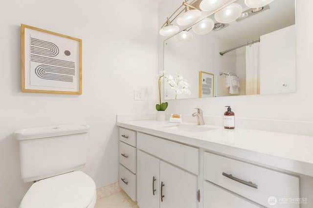 11515 Greenwood Ave N Unit C, Seattle, WA 98133 - bathroom with vanity, toilet, tile patterned floors, and a shower with shower curtain