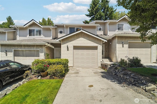 2419 S Meridian Unit B8, Puyallup, WA 98373 - view of property with concrete driveway and a garage