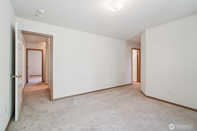 2419 S Meridian Unit B8, Puyallup, WA 98373 - unfurnished room featuring light colored carpet and a smoke detector