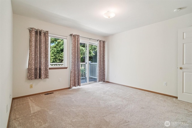 2419 S Meridian Unit B8, Puyallup, WA 98373 - spare room featuring carpet floors