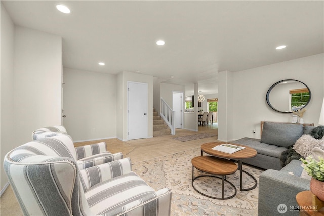 living area with stairway, recessed lighting, and baseboards