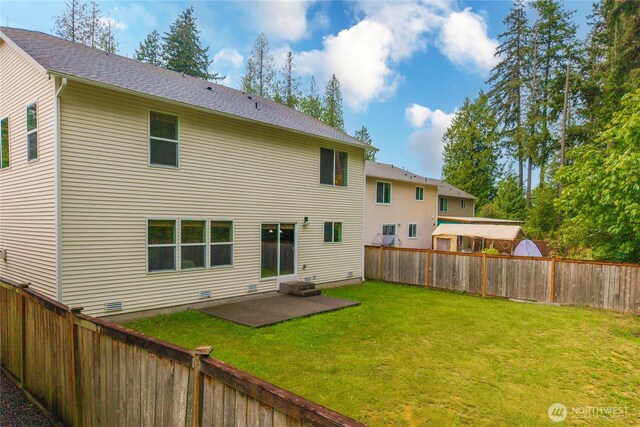 back of property featuring a patio area