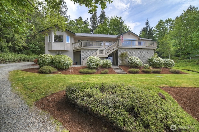 2660 NW Canal View Way, Poulsbo, WA 98370 - view of front of home featuring stairway, a front lawn, and a wooden deck