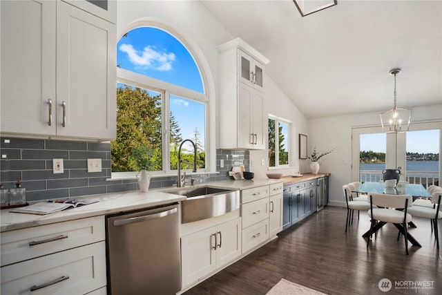 1420 Mitchell Rd, Lake Stevens, WA 98258 - kitchen with dishwasher, a sink, vaulted ceiling, tasteful backsplash, and a chandelier