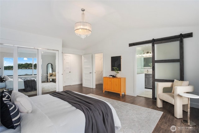 1420 Mitchell Rd, Lake Stevens, WA 98258 - bedroom with lofted ceiling, dark wood-style flooring, a chandelier, a closet, and baseboards