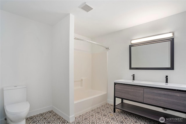 1420 Mitchell Rd, Lake Stevens, WA 98258 - bathroom with toilet, baseboards, double vanity, and tub / shower combination