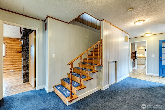 833 S Point Rd, Port Ludlow, WA 98365 - stairway with carpet floors, ornamental molding, and baseboards