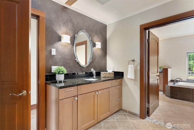 790 N Hamma Ridge Dr, Lilliwaup, WA 98555 - bathroom featuring tile patterned flooring, vanity, ornamental molding, a bath, and baseboards
