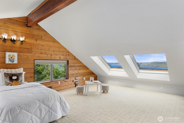790 N Hamma Ridge Dr, Lilliwaup, WA 98555 - carpeted bedroom with a skylight and wood walls