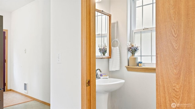 6508 NE Plum St, Suquamish, WA 98392 - bathroom featuring baseboards