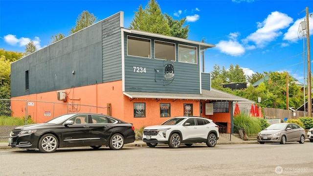 6508 NE Plum St, Suquamish, WA 98392 - view of front facade featuring stucco siding