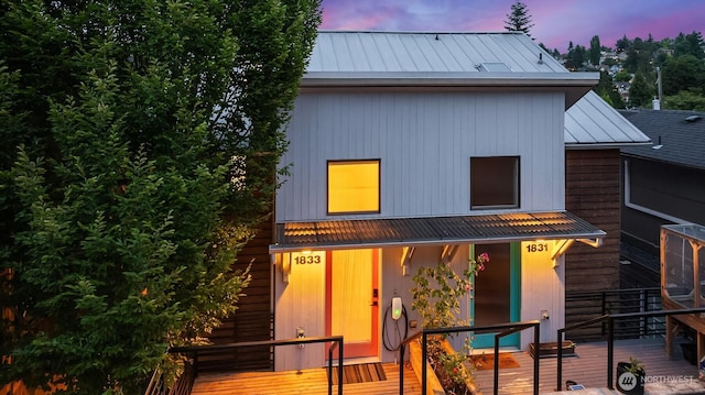 1833 27th Ave, Seattle, WA 98122 - view of front facade featuring a metal roof, a standing seam roof, and a deck