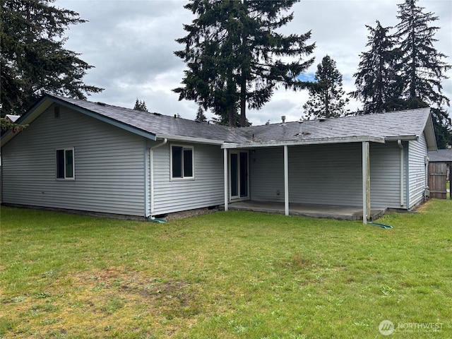 1115 156th St E, Tacoma, WA 98445 - rear view of house featuring a lawn
