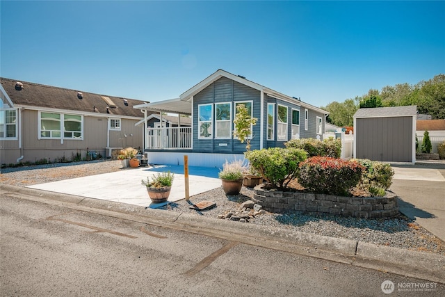 4751 Birch Bay Lynden Rd Unit 51, Blaine, WA 98230 - manufactured / mobile home featuring concrete driveway and covered porch