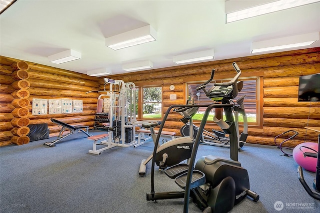4751 Birch Bay Lynden Rd Unit 51, Blaine, WA 98230 - gym with log walls, carpet flooring, and an AC wall unit