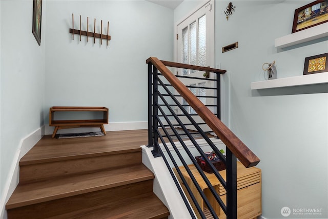 1524 NE 140th Unit D2, Seattle, WA 98125 - staircase with wood finished floors and baseboards