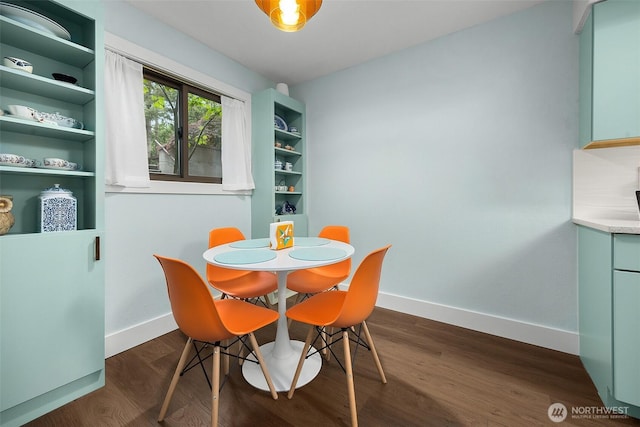 1524 NE 140th Unit D2, Seattle, WA 98125 - dining room with baseboards and dark wood-style flooring