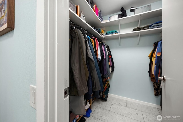1524 NE 140th Unit D2, Seattle, WA 98125 - spacious closet featuring tile patterned floors