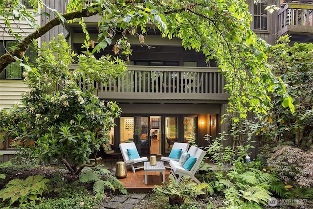 1524 NE 140th Unit D2, Seattle, WA 98125 - rear view of property with french doors, a balcony, and a deck