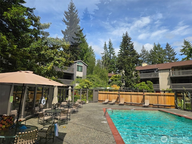 1524 NE 140th Unit D2, Seattle, WA 98125 - community pool featuring a patio